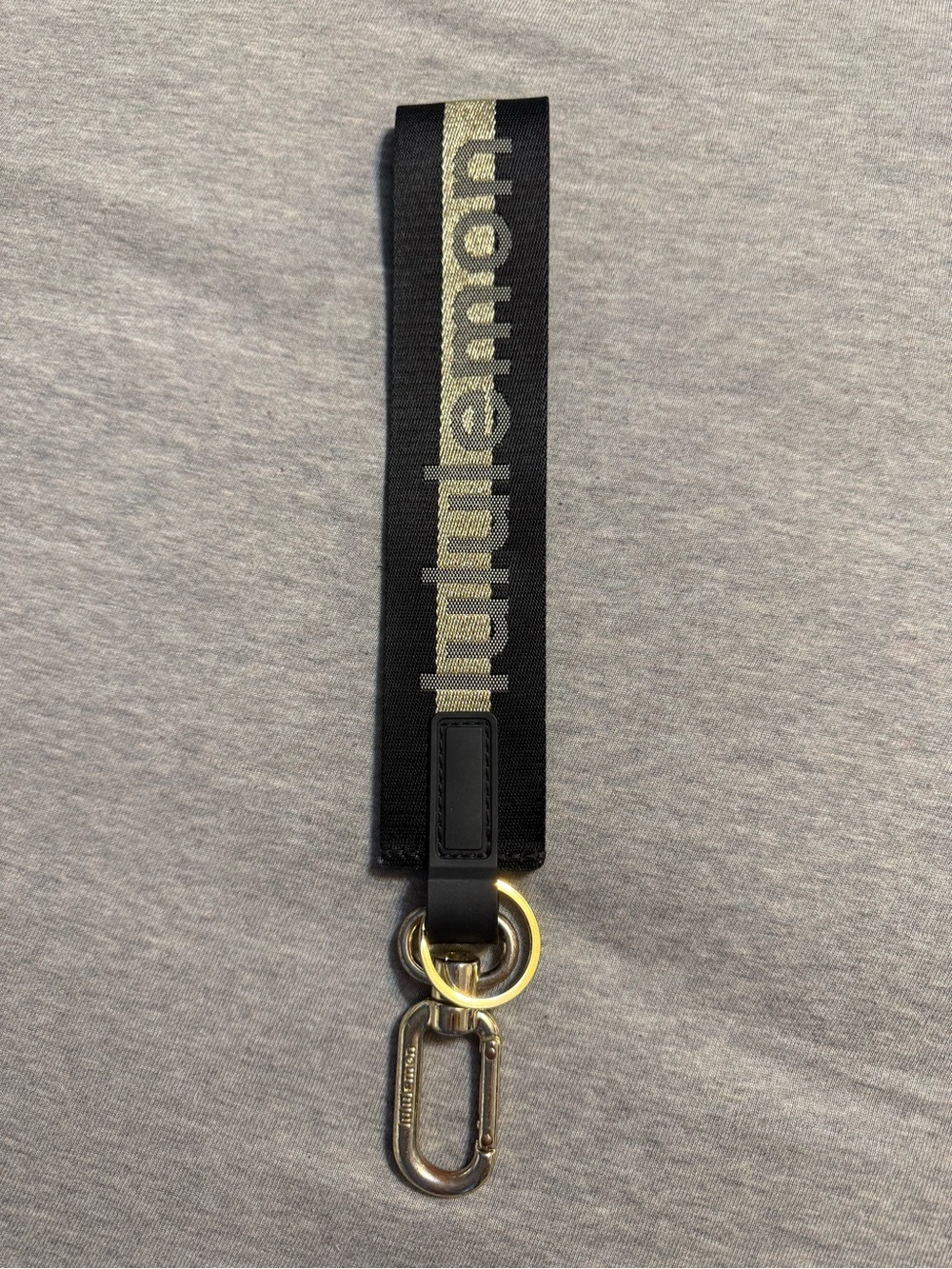 lululemon athletica Black and Gold Logo Key Strap